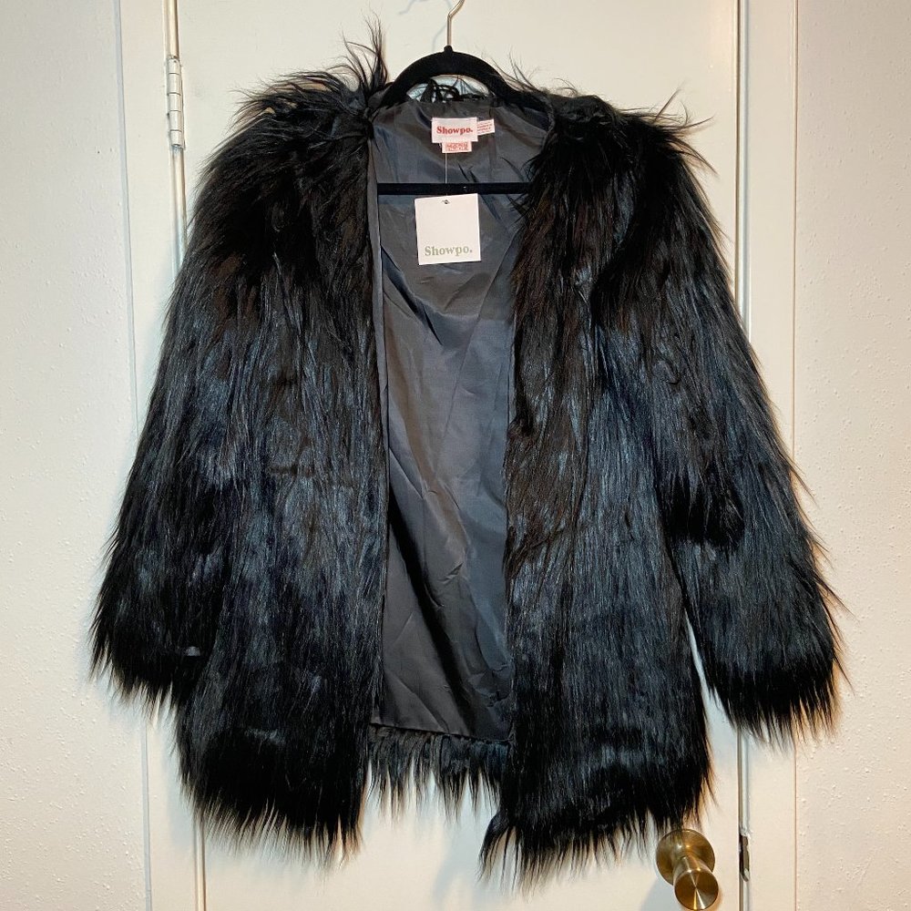 black faux fur coat